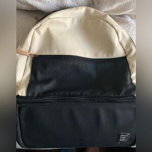 Petunia Pickle Bottom black and cream backpack diaper bag